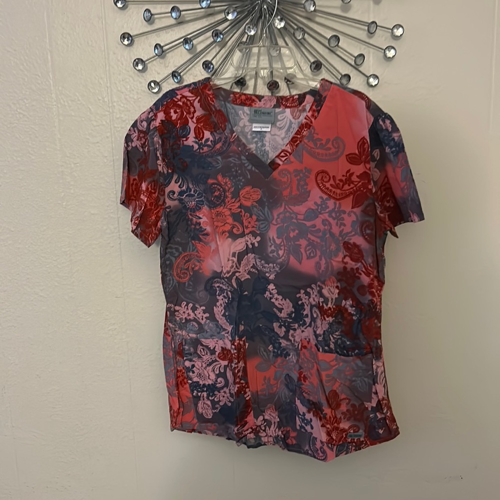 Red colored scrub top